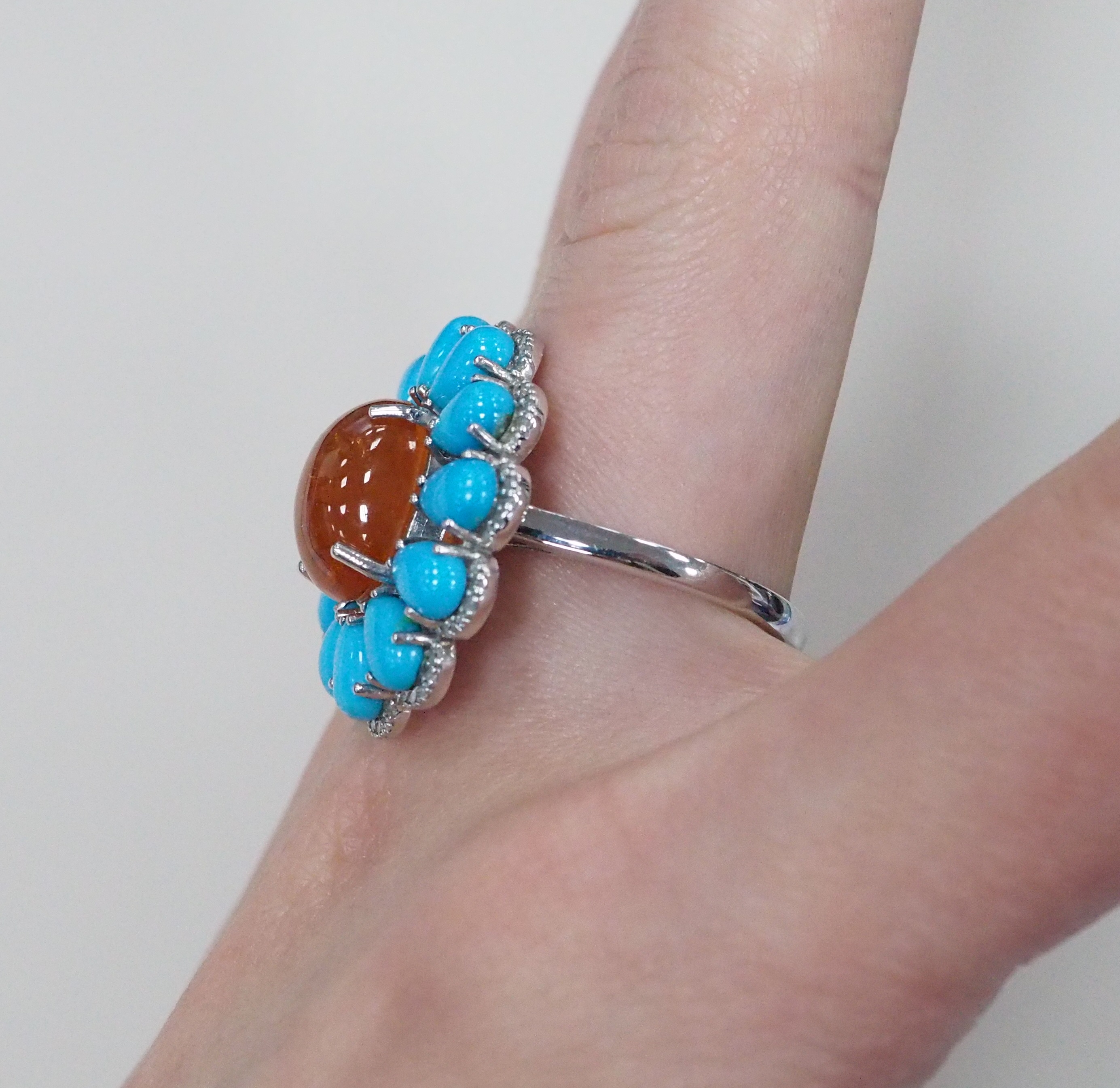 Серебряное кольцо со спессартином и бирюзой